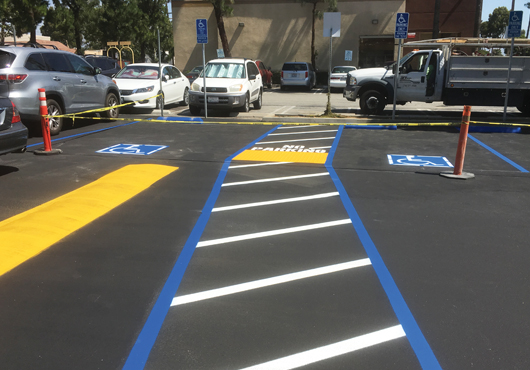 ACR Concrete & Asphalt Construction, Inc. completed an ADA-compliant asphalt parking lot, including a clearly marked path of travel, for the Rosemead Place Shopping Center in Rosemead, California. (Inset) Tony Guichard, President and Founder of ACR Concrete & Asphalt Construction, Inc., has significant experience addressing complex compliance issues and is committed to improving access to individuals with disabilities.